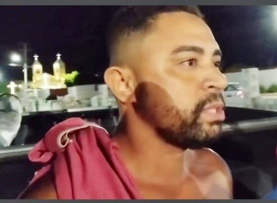 Alex ao chegar na delegacia de polícia (foto: reprodução vídeo jnmt)